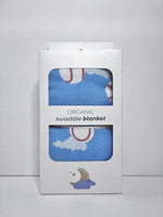 Organic swaddle blanket packaging with baseball design on a white background