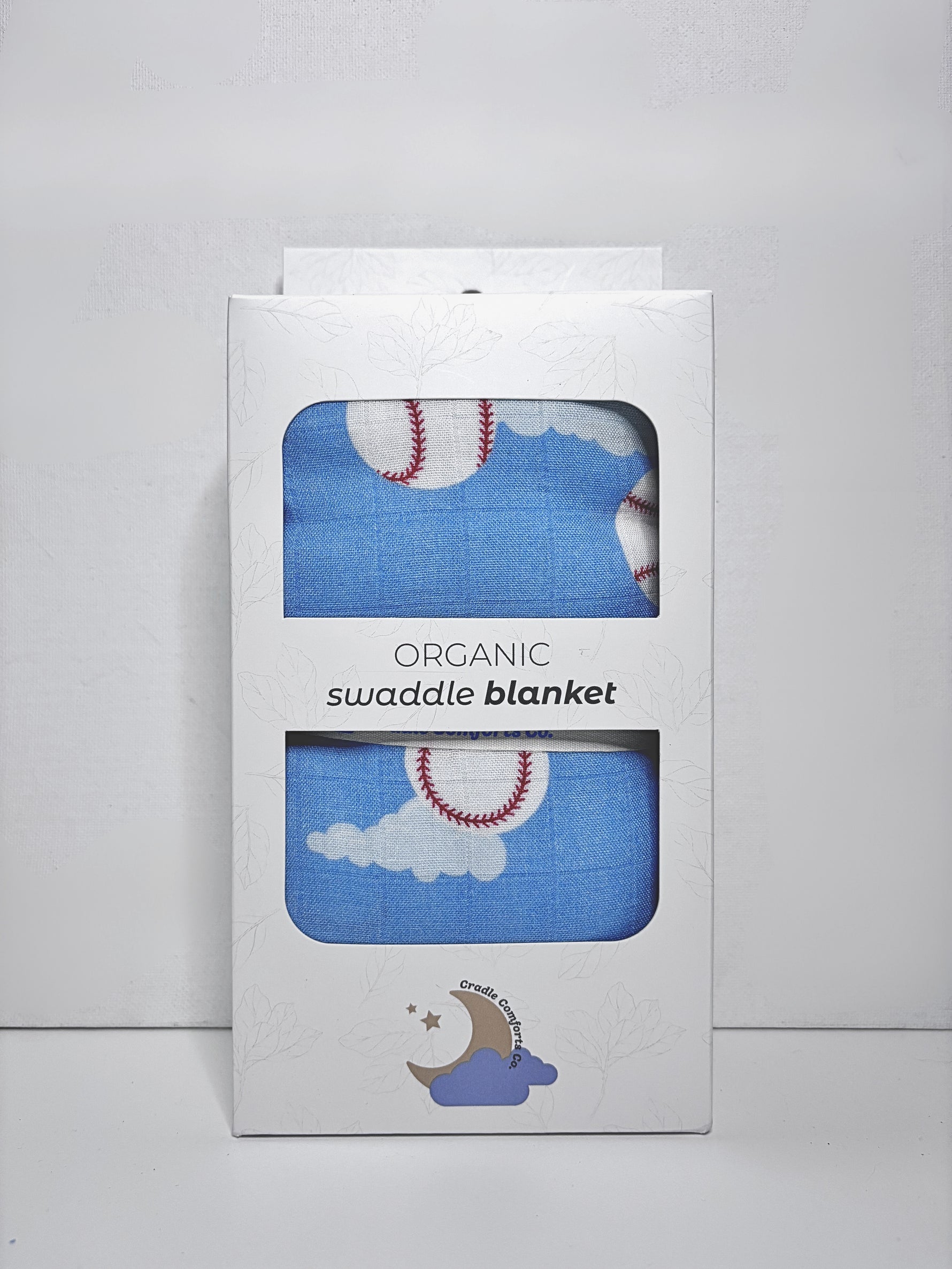 Organic swaddle blanket packaging with baseball design on a white background